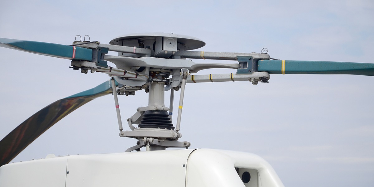 helicopter screw engine close up against blue sky